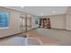 Finished basement with a neutral carpet and mirrored closet doors at 10087 E Hawaii Pl, Aurora, CO 80247