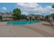 A lovely community pool with comfortable lounge chairs and a serene environment at 10087 E Hawaii Pl, Aurora, CO 80247