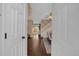 Inviting foyer showcasing hardwood floors and an open floor plan with a staircase leading to the upper level at 10087 E Hawaii Pl, Aurora, CO 80247