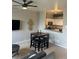 Cozy living space featuring an open-concept design connecting the kitchen and living area at 9758 Laredo St # 37C, Commerce City, CO 80022