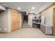 Finished basement with an office area and stairs at 16321 Parkside Dr, Parker, CO 80134