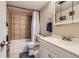 Clean bathroom with modern fixtures, a shower, and essential amenities for a relaxing and functional space at 4643 S Lowell Blvd # B, Denver, CO 80236