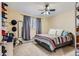 Comfortable bedroom with ample natural light, complemented by cozy decor and a peaceful ambiance at 4643 S Lowell Blvd # B, Denver, CO 80236