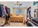 Cozy bedroom with unique decor, a window, and closet space for style and storage at 4643 S Lowell Blvd # B, Denver, CO 80236