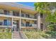Inviting condo with balcony and outdoor space, enhanced by well-maintained landscaping and a cozy, welcoming facade at 4643 S Lowell Blvd # B, Denver, CO 80236