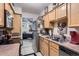 Efficient kitchen with modern appliances and ample counter space, great for cooking and entertaining at 4643 S Lowell Blvd # B, Denver, CO 80236