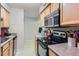 Functional kitchen featuring modern appliances and a clean design, optimized for convenience and culinary endeavors at 4643 S Lowell Blvd # B, Denver, CO 80236
