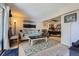 Comfortable living room with large windows, complemented by stylish furniture and decor for a cozy, inviting atmosphere at 4643 S Lowell Blvd # B, Denver, CO 80236