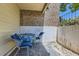 Cozy patio area with a charming table and chairs, perfect for outdoor relaxation and dining at 4643 S Lowell Blvd # B, Denver, CO 80236