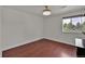Empty room with hardwood floors and a window at 8446 Lightening View Dr, Parker, CO 80134