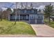 Beautiful two-story home with a two car garage and a well-manicured lawn at 8446 Lightening View Dr, Parker, CO 80134