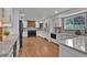 Modern kitchen featuring white cabinets, stainless steel appliances, and stylish countertops at 8446 Lightening View Dr, Parker, CO 80134