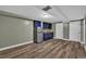 Inviting kitchenette featuring a stainless steel refrigerator and blue cabinetry in an open space at 8446 Lightening View Dr, Parker, CO 80134