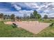 A spacious community playground with swings, slide, and benches offers an engaging outdoor space for residents at 8446 Lightening View Dr, Parker, CO 80134
