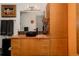 Bathroom featuring modern vessel sink, stylish cabinets, and decorative artwork at 2460 W 29Th Ave # 104, Denver, CO 80211