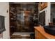 Modern bathroom with walk-in shower, sleek hardware, and contemporary design at 2460 W 29Th Ave # 104, Denver, CO 80211