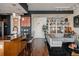 Open-concept living area with modern kitchen, comfortable seating, and stylish decor at 2460 W 29Th Ave # 104, Denver, CO 80211