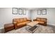 Spacious basement Gathering room with leather sofas at 741 S 6Th Ave, Brighton, CO 80601