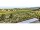 Scenic backyard overlooks a green hillside and provides a relaxing natural view for the home at 18280 W 85Th Dr, Arvada, CO 80007