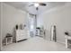 Bright bedroom featuring plush carpeting and natural light from a large window at 18280 W 85Th Dr, Arvada, CO 80007