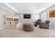 Finished basement rec room featuring bunk beds, large TV, and comfortable seating area at 2065 Sage Grouse Way, Castle Rock, CO 80109