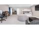 Spacious finished basement with bunk beds, workspace, and comfortable seating area at 2065 Sage Grouse Way, Castle Rock, CO 80109