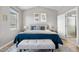 Cozy bedroom with a comfortable bed, stylish decor, and an ensuite bathroom for added convenience at 2065 Sage Grouse Way, Castle Rock, CO 80109