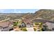 Charming home with well-manicured landscaping, complemented by an attached three-car garage and a concrete driveway at 2065 Sage Grouse Way, Castle Rock, CO 80109