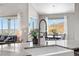 Kitchen sink with a view to the dining room and the living room, offering a cohesive living space at 2065 Sage Grouse Way, Castle Rock, CO 80109