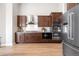 Well-equipped kitchen boasts stainless steel appliances, ample cabinet space, and subway tile backsplash at 2065 Sage Grouse Way, Castle Rock, CO 80109