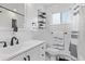 Bathroom with black hardware and marble tile at 2291 W 54Th Ave, Denver, CO 80221