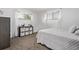 Bedroom with a bed, side table and dresser at 2291 W 54Th Ave, Denver, CO 80221