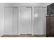 Bedroom closet with white sliding doors at 2291 W 54Th Ave, Denver, CO 80221