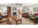 Spacious living room features a fireplace, hardwood floors, and comfortable seating at 14194 W Amherst Ave, Lakewood, CO 80228