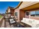 Comfortable back porch with patio furniture perfect for outdoor entertaining and relaxation at 881 W 128Th Pl, Westminster, CO 80234
