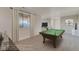 Basement game room with a pool table, neutral walls, and ample space for recreation at 881 W 128Th Pl, Westminster, CO 80234