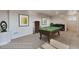 Finished basement with a pool table and stylish decor perfect for entertaining guests at 881 W 128Th Pl, Westminster, CO 80234