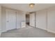Bedroom with carpet, double closets, and natural light at 881 W 128Th Pl, Westminster, CO 80234