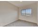 Well-lit bedroom featuring a large window with neighborhood views at 881 W 128Th Pl, Westminster, CO 80234