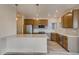 Modern kitchen with stainless steel appliances, countertops, and ample cabinet space at 881 W 128Th Pl, Westminster, CO 80234