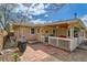 Backyard patio with a covered porch and a grill, perfect for outdoor entertaining at 273 S 13Th Ave, Brighton, CO 80601