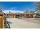 Charming home with a well-maintained front yard, driveway, and a single-car garage at 273 S 13Th Ave, Brighton, CO 80601