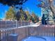 Cozy backyard with wooden fence and snowy ground at 15475 E Louisiana Ave, Aurora, CO 80017