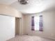 Bright bedroom with vaulted ceiling and sliding door closet at 15475 E Louisiana Ave, Aurora, CO 80017
