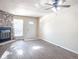 Living room with fireplace and wood-look flooring at 15475 E Louisiana Ave, Aurora, CO 80017
