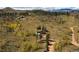 Aerial view of a rustic mountain home surrounded by a beautiful landscape at 97 Hedges Cir, Sedalia, CO 80135