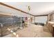 Organized garage featuring shelving, storage cabinets, and ample workspace at 97 Hedges Cir, Sedalia, CO 80135