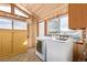 Laundry room featuring modern washer and dryer and scenic view at 97 Hedges Cir, Sedalia, CO 80135