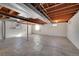 Unfinished basement offers ample storage space with exposed beams and windows at 13769 Omega Cir, Lone Tree, CO 80124