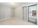 Finished basement space with tile flooring and walk out access, ready for customization at 3089 S Quintero Way, Aurora, CO 80013